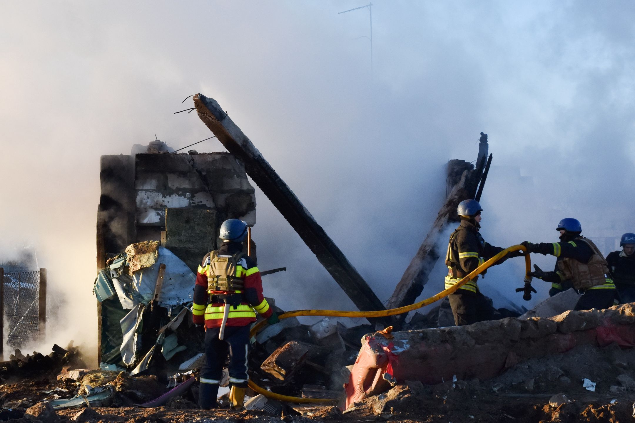 ZAPORIZHZHIA, UKRAINE - 2023/03/31: Ukrainian State Emergency Service firefighters put out the fire after the Russian shelling hit suburban area in Zaporizhzhia. On the night of March 31, the Russian occupying army shelled Zaporizhzhia with MLRS (Multiple Launch Rocket System). As the Ukrainian News Agency earlier reported, in addition, during the night, the aggressor country, the Russian Federation, launched 10 Shahed attack drones over Ukraine, 9 of which were destroyed by the air defense forces. (Photo by Andriy Andriyenko/SOPA Images/LightRocket via Getty Images)