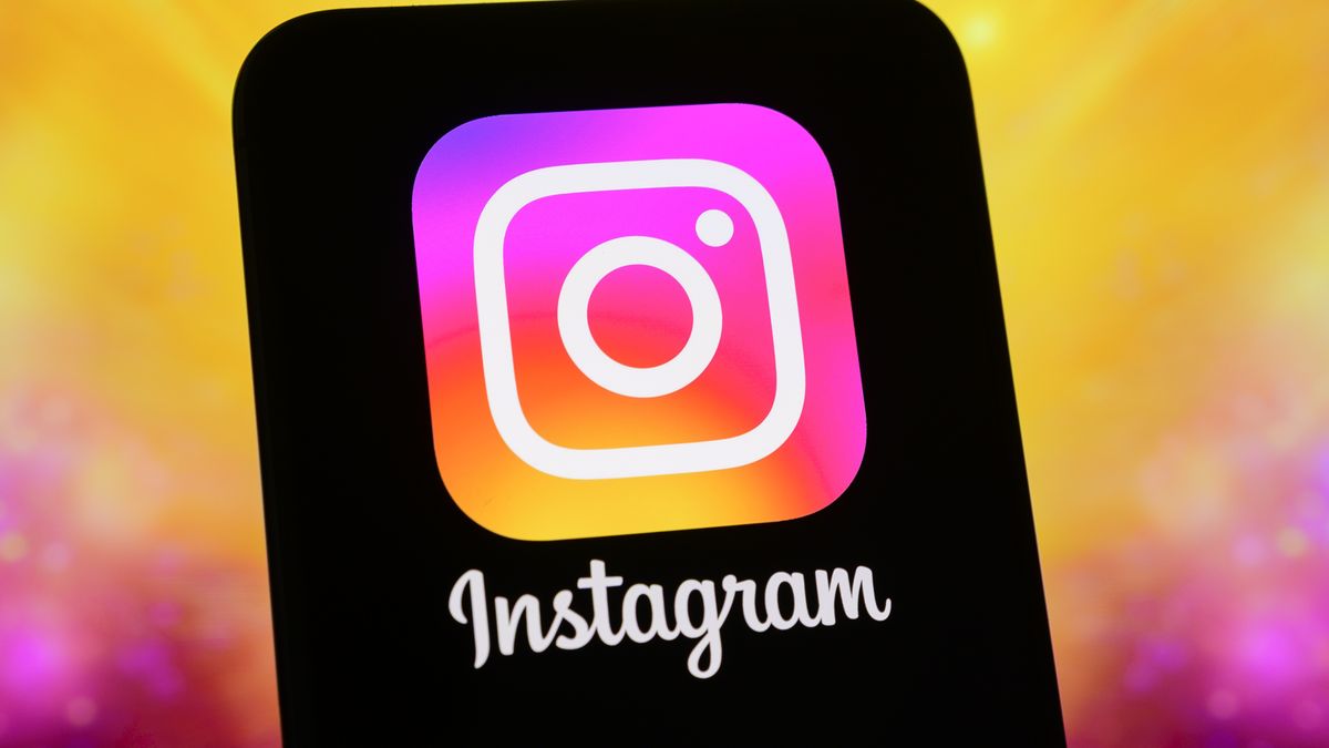 The Instagram logo is displayed on a smartphone screen with a colorful abstract illustration in the background, in Creteil, France, on May 15, 2026. A new ephemeral photo sharing feature is available on the Instagram app and via a standalone app. (Photo by Samuel Boivin/NurPhoto via Getty Images)