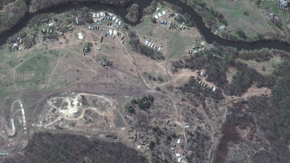 RUSSIANS INVADE UKRAINE -- APRIL 11, 2022:  01 Maxar satellite imagery of new deployment of troops, tents and vehicles west of Soloti, Russia.  11april2022_wv2.  Please use: Satellite image (c) 2022 Maxar Technologies.
