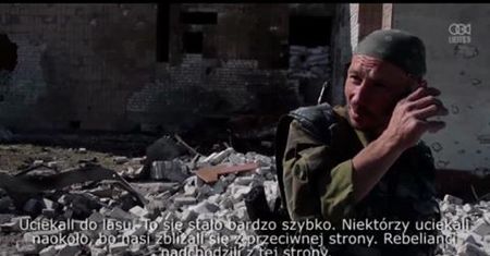 Prorosyjscy bojownicy sprawdzają szkody wyrządzone przez walki w niewielkim mieście koło Ługańska