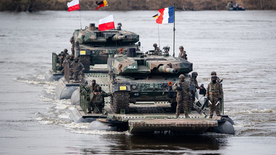KORZENIEWO, POLAND - MARCH 4: French and Polish soldiers are crossing the Vistula River during the NATO Dragon 24 military exercise on March 4, 2024 in Korzeniewo, Poland. Dragon 24 is a key element of NATO maneuvers as part of Steadfast Defender 24. About 20 thousand troops of 10 different countries take part of exercises. (Photo by Mateusz Slodkowski/DeFodi Images News via Getty Images)