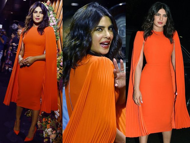 Cała na pomarańczowo Priyanka Chopra reklamuje aplikację randkową w Bombaju