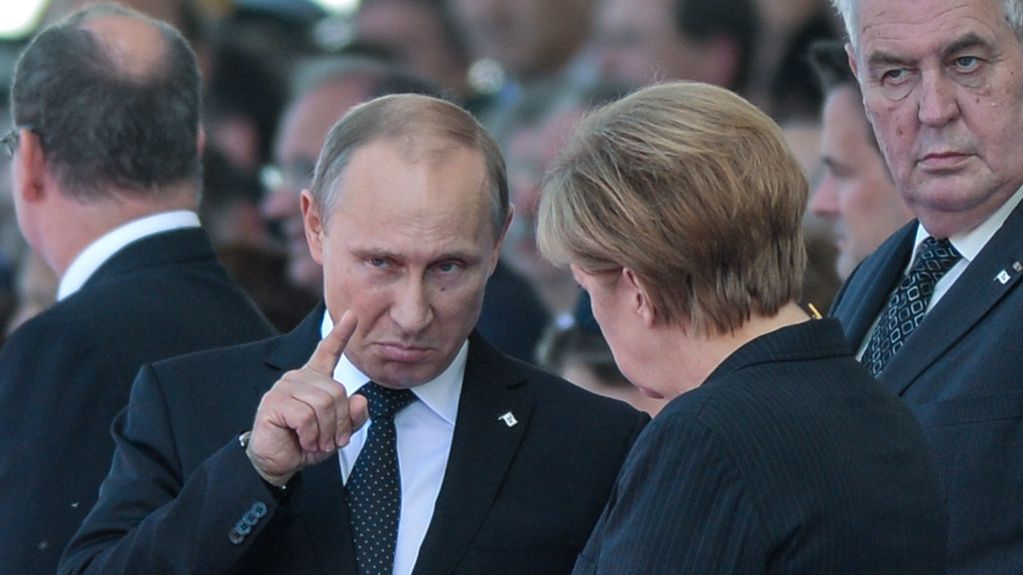 OUISTREHAM, FRANCE - JUNE 06: 
In this file photo German Chancellor Angela Merkel and Russian President Vladimir Putin came face to face as they attend commemoration ceremonies marking the 70th anniversary of the D-day invasion of Nazi-occupied Normandy on June 6, 2014 in Ouistreham, France. 
As the world looked on, an intense discussion took place between the two leaders,
Later on that day, US President Barack Obama called on Putin to take immediate action to ease the escalating tensions in eastern Ukraine. Obama warned Putin that failure to cooperate with the government in Kiev would lead to Russia's further isolation from the international community. The meeting was a pivotal moment that would shape the future of relations between these nations. (Photo by Artur Widak/NurPhoto via Getty Images)