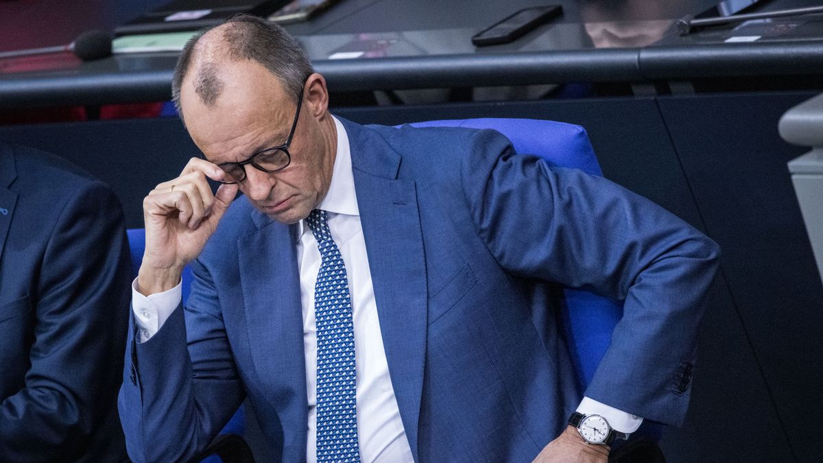 BERLIN, GERMANY - DECEMBER 17: German Chancellor Friedrich Merz reacts ahead of a question and answer session at the Bundestag before he gave a government statement ahead of the upcoming meeting of the European Union Council on December 17, 2025 in Berlin, Germany. The EU Council will meet on December 18-19 in Brussels with a possible ceasefire in Ukraine high on the agenda. (Photo by Nadja Wohlleben/Getty Images)