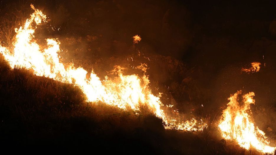Wildfires continue in Italy's Sicily as Europe on alert against heatwaves
SICILY, ITALY - JULY 25: A large forest fire that broke out in Pioppo, near the city of Palermo on the island of Sicily, Italy, continues to burn on July 25, 2025. Forestry brigade, firefighters, and civil protection teams work tirelessly to contain the flames. Brigades have been battling the blaze since last night. (Photo by Alberto Lo Bianco/Anadolu via Getty Images)
Anadolu
residential threat, forestry brigade, pioppo, firefighting efforts, civil protection, wildfire, heatwave, palermo, emergency response