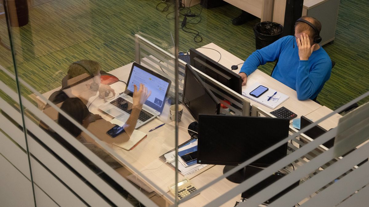 Workers inside a Softline Holding Ltd. office in Moscow, Russia, on Thursday, Oct. 21, 2021. Softline, an IT services and cybersecurity provider founded by Russian businessman Igor Borovikov, set a price range for its initial public offering in London and Moscow that values the company at as much as $1.93 billion. Photographer: Andrey Rudakov/Bloomberg via Getty Images