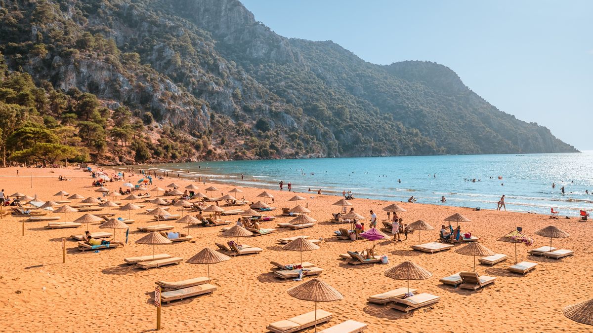 09 September 2020, Dalyan, Turkey: Aerial view of a popular resort Iztuzu beach with luxury sun umbrellas and loungers and fine yellow sand. Sea paradise and relaxation concept
09 September 2020, Dalyan, Turkey: Aerial view of a popular resort Iztuzu beach with luxury sun umbrellas and loungers and fine yellow sand. Sea paradise and relaxation concept
frantic00