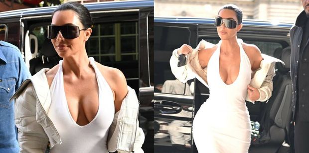 Kim Kardashian w białej sukni z IMPONUJĄCYM dekoltem przyciąga spojrzenia w Paryżu (ZDJĘCIA)