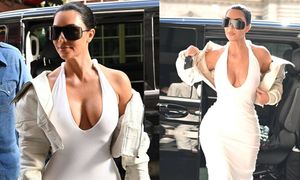 Kim Kardashian w białej sukni z IMPONUJĄCYM dekoltem przyciąga spojrzenia w Paryżu (ZDJĘCIA)