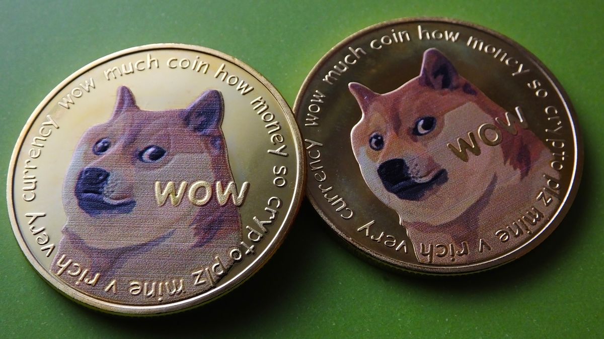 YICHANG, CHINA - APRIL 26: Visual representations of digital cryptocurrencies Dogecoin are seen on April 26, 2021 in Yichang, Hubei Province of China. (Photo by Liu Junfeng/VCG via Getty Images)