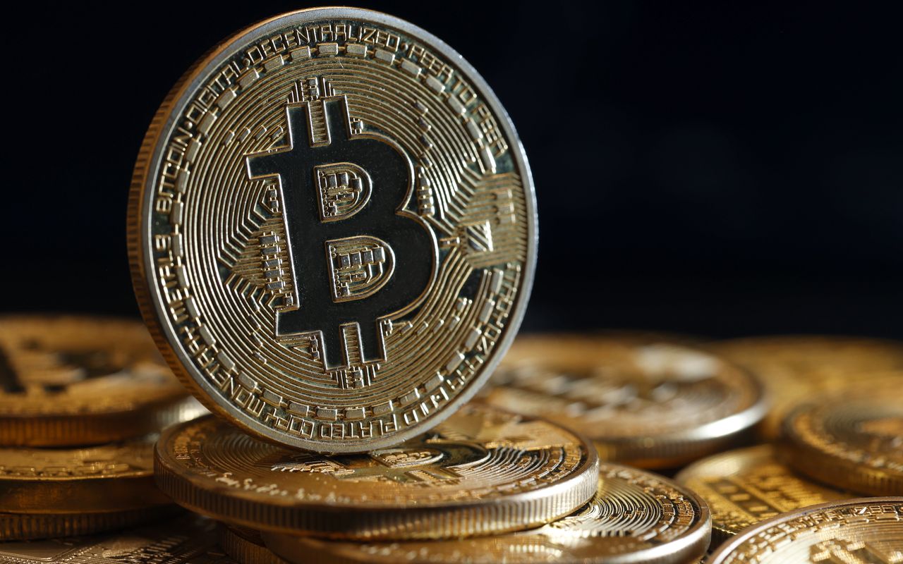 Bitcoin hits new high of $71,200, sparking speculation of $100k future
