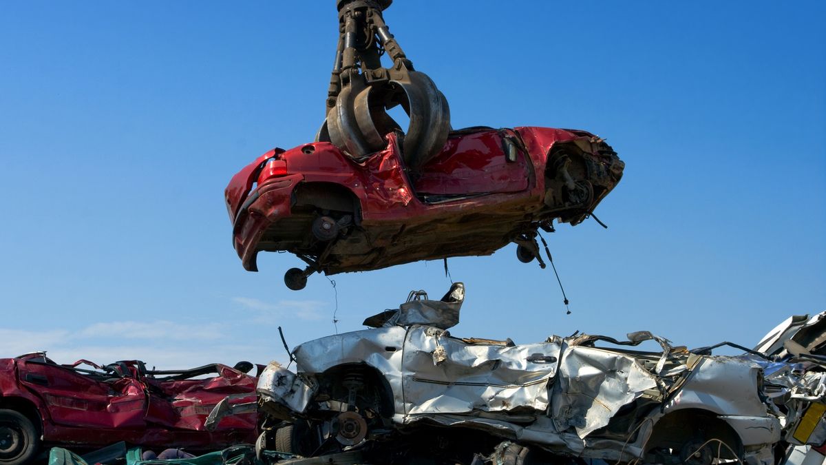 Crane picking up carCrane picking up a car in a junkyardhroeAluminum, Automobile Industry, Breaking, Broken, Car, Crane, Crushed, Demolished, Demolishing, Destruction, Environment, Flat, Garbage, Garbage Dump, Gripping, Heap, Hoisting, Industry, Iron, Junkyard, Landfill, Mechanical Grabber, Metal, Metal Industry, No People, Obsolete, Old, Picking Up, Pollution, Recycling, Recycling Center, Scrap Metal, Stack, Steel, Vehicle Part