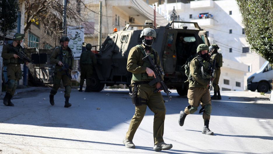 BETHLEHEM, WEST BANK - FEBRUARY 6: Israeli forces intervene in protesters during protest after Israeli forces' made a raid on Beit Cala town, where the car used in attack left, in Bethlehem, West Bank on February 6, 2020. At least 12 Israeli soldiers were injured in a car-ramming attack in Western Jerusalem Thursday morning, Israeli army said. (Photo by Wisam Hashlamoun/Anadolu Agency via Getty Images)