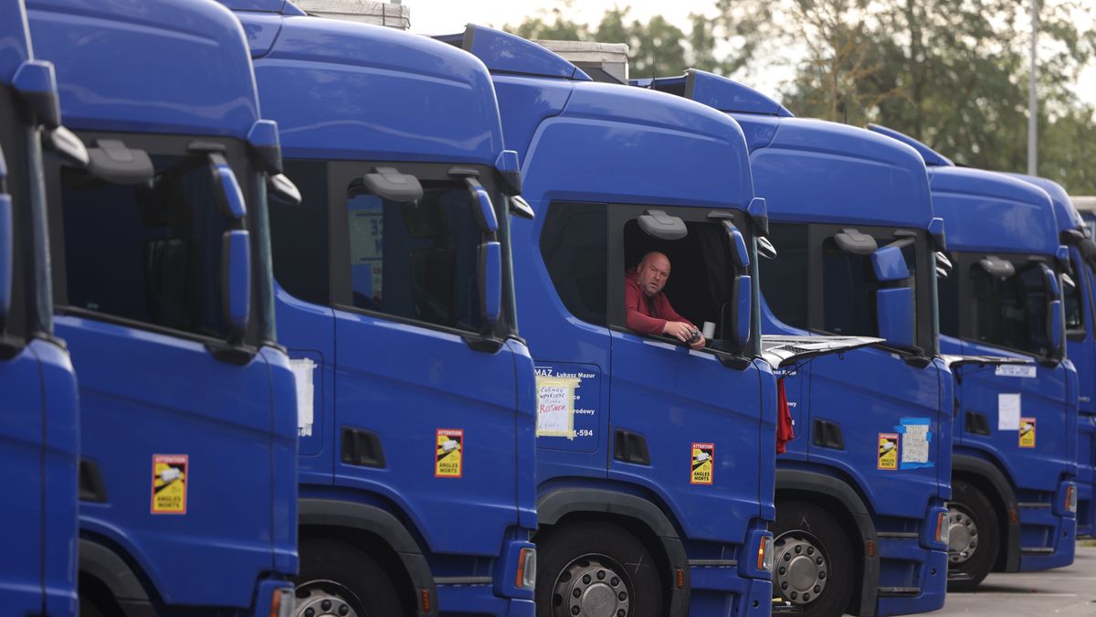 DARMSTADT, GERMANY - SEPTEMBER 20: A striking truck driver sits in his truck at the Graefenhausen West highway rest area on the second day of a hunger strike by about 30 of his colleagues on September 20, 2023 near Darmstadt, Germany. The approximately 80 truck drivers from countries including Georgia, Uzbekistan and Tajikistan have been living at the rest area in their trucks since they went on strike against their Polish employer, Lukasz Mazur, two months ago over missing pay. Local politicians and trade unionists have been supporting the truckers, though so far Mazur has refused to negotiate and instead has filed a lawsuit against the truckers over extortion. Edwin Atema, a trade unionist from Holland who is helping the truckers legally, says their case is an example of a much larger problem of labor exploitation of truckers across Europe. (Photo by Sean Gallup/Getty Images)