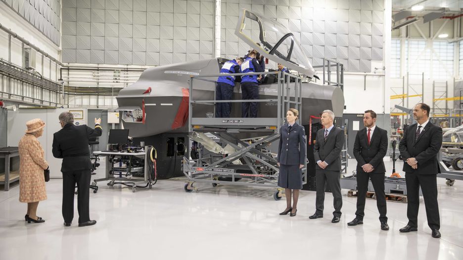 KING'S LYNN, ENGLAND - FEBRUARY 03: Queen Elizabeth II meets personnel at RAF Marham where she inspected the new integrated training centre that trains personnel on the maintenance of the new RAF F-35B Lightning II strike aircraft at Royal Air Force Marham on February 3, 2020 in King's Lynn, England. (Photo by Richard Pohle - WPA Pool/Getty Images)