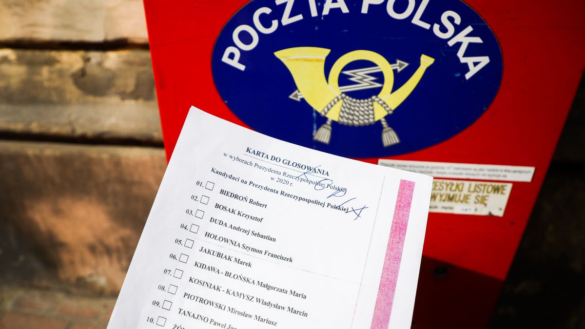 A copy of the 'election package' documents is photographed for illustration photo with Poczta Polska mailbox in the background. Krakow, Poland on May 2nd, 2020.  A voting package leaked in the upcoming correspondence election with a full list of candidates for Presidential office and with name and surname statement on secret voting. Despite coronavirus pandemic, Poland's government plans to hold the presidential election on May 10 in the form of a correspondence vote. (Photo by Beata Zawrzel/NurPhoto via Getty Images)