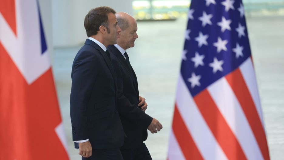 Olaf Scholz, Germany's chancellor, and Emmanuel Macron, France's president, left to right, during a family photo session at the Chancellery in Berlin, Germany, on Friday, Oct. 18, 2024. President Joe Biden warned that Ukraine faces "a very difficult winter" and urged America's allies to maintain their support for the government in Kyiv. Photographer: Krisztian Bocsi/Bloomberg via Getty Images
