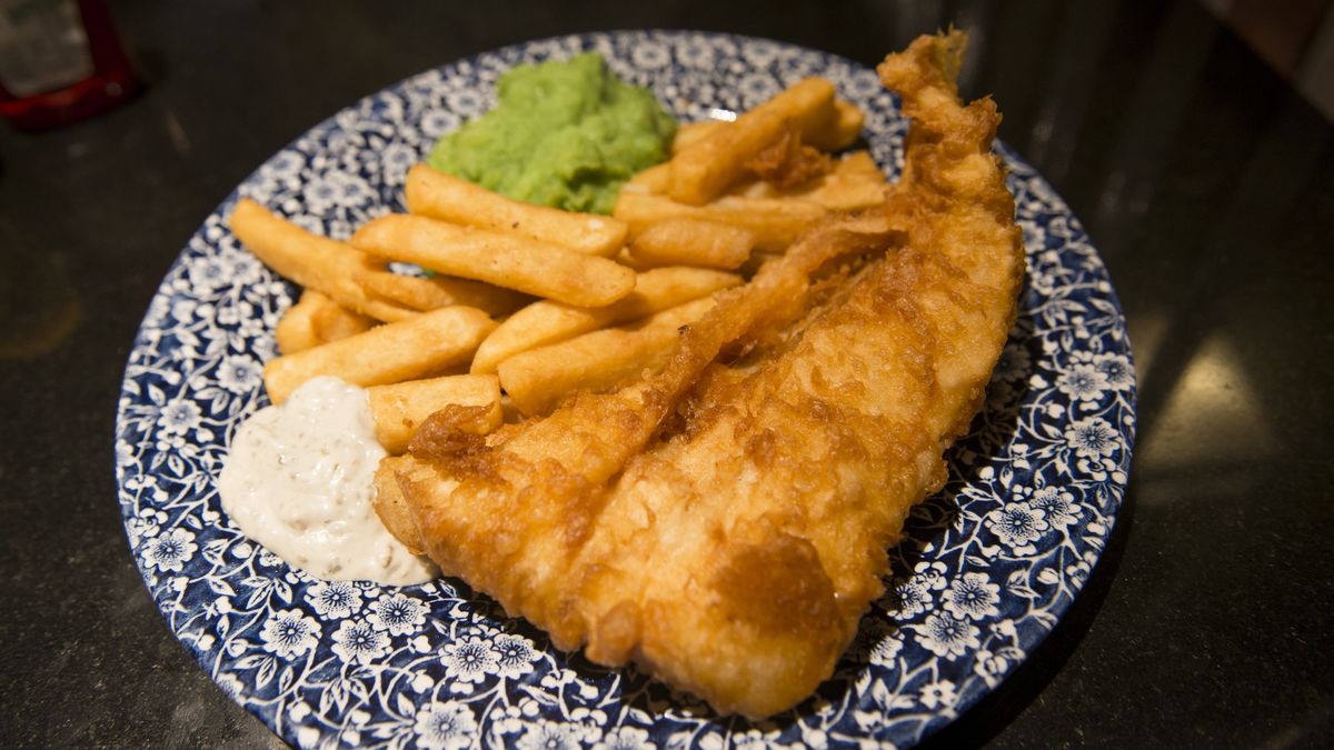 A plate of fish and chips
Fish and chips is a hot dish of British origin consisting of fried battered fish and chips. London UK
Sunphol Sorakul
uk, british culture, capital cities, city, city life, england, english culture, europe, fish and chips, food and drink, tradition, london - england, food, plate, meal, close-up, fish, deep fried, potato chip, No People