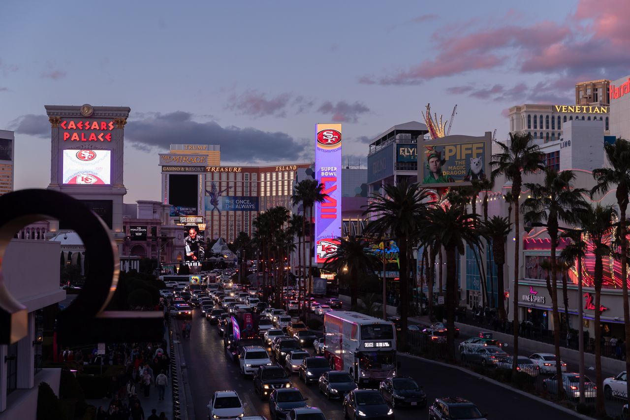 LAS VEGAS, NEVADA - FEBRUARY 10: A commercial sign show the logos of the Super Bowl LVIII, the San Francisco 49ers and the Kansas City Chiefs ahead of Super Bowl LVIII on February 10, 2024 in Las Vegas, Nevada. (Photo by Mario Hommes/DeFodi Images via Getty Images)