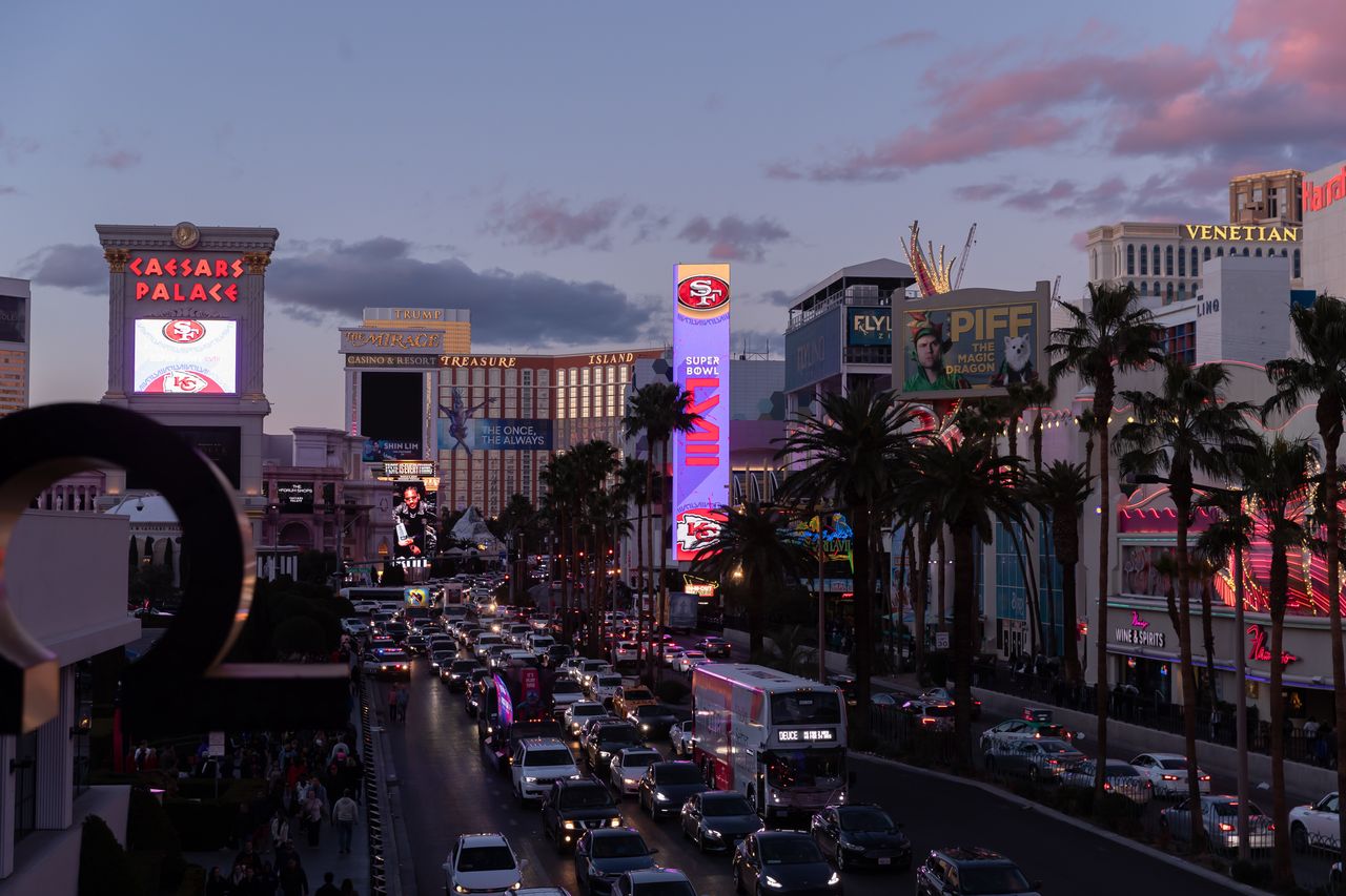 LAS VEGAS, NEVADA - FEBRUARY 10: A commercial sign show the logos of the Super Bowl LVIII, the San Francisco 49ers and the Kansas City Chiefs ahead of Super Bowl LVIII on February 10, 2024 in Las Vegas, Nevada. (Photo by Mario Hommes/DeFodi Images via Getty Images)