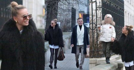 Odziana w czarne futro Izabela Janachowska kroczy dumnie obok męża, trzymając za rękę chodzącego po murku syna. Rodzina jak z obrazka?