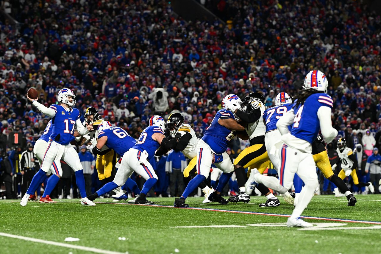 ORCHARD PARK, NY - JANUARY 15: Josh Allen #17 of the Buffalo Bills looks to throw the football during the first half of the NFL wild-card playoff football game against the Pittsburgh Steelers at Highmark Stadium on January 15, 2024 in Orchard Park, New York. (Photo by Kathryn Riley/Getty Images)