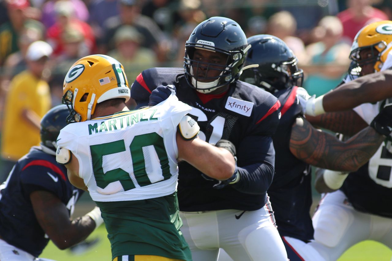 ASHWAUBENON, WI - AUGUST 05: Houston Texans offensive guard Maurquice Shakir (61) blocks Green Bay Packers linebacker Blake Martinez (50) during a joint practice of the Green Bay Packers and the Houston Texans at Ray Nitschke Field on August 5, 2019 in Ashwaubenon, WI. (Photo by Larry Radloff/Icon Sportswire via Getty Images)