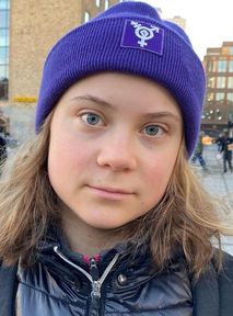 Greta Thunberg in shock. Man grabs her microphone at climate protest