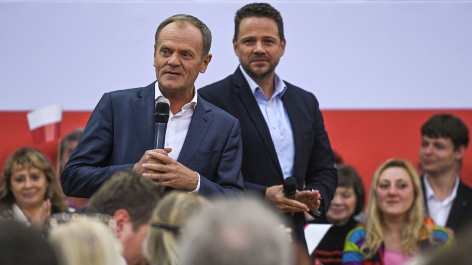 KRAKOW, POLAND - MAY 15, 2023: , Leader of the Civic Platform opposition party, Donald Tusk, and Mayor of Warsaw, Rafal Trzaskowski, unite in Krakow, sharing vision for Poland's progress, on May 15, 2023, in Krakow, Poland.
Chairman Donald Tusk's visit to Krakow marked the 10th stop of the Civic Platform party's tour. The 'Tusk Show' united residents for the #HereIsTheFuture campaign, featuring a mix of familiar and new elements. The dynamic exchange and passionate speeches echoed the March 4th march, rallying all to unite in Warsaw. (Photo by Artur Widak/NurPhoto via Getty Images)