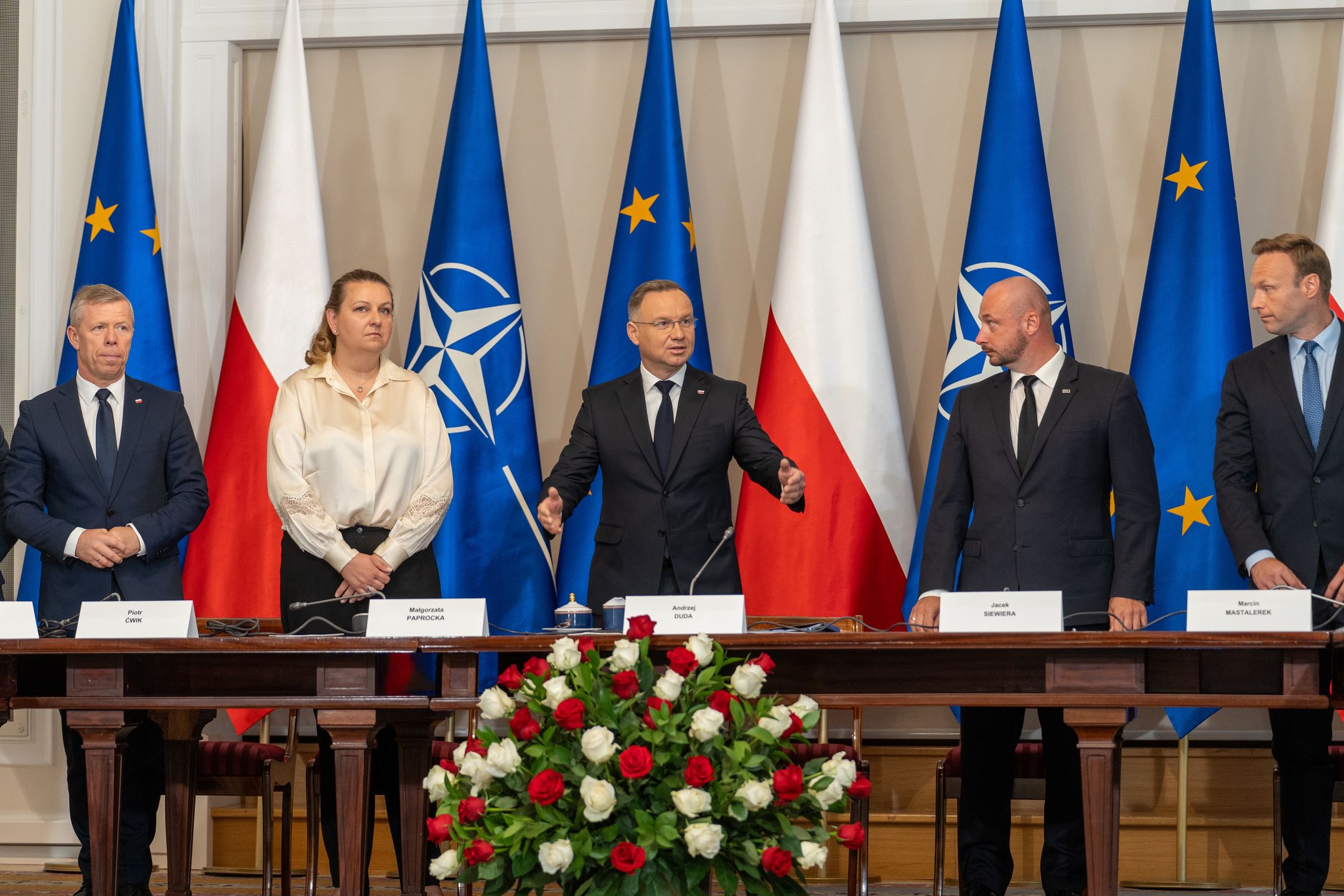 WARSAW, POLAND - 2024/07/08: (L2-R) Magorzata Paprocka head of the Chancellery of the President of the Republic of Poland, President Andrzej Duda, Jacek Siewiera, Secretary of State, Head of the National Security Bureau, and Marcin Mastalerek - Secretary of State, Chief of the Cabinet of the President of the Republic of Poland seen during a meeting of the national security council. The meeting of the National Security Council convened by President Andrzej Duda began on Monday morning. It takes place before the departure of the Polish delegation to Washington, D.C., for the NATO summit. In the meeting participated, among others, Prime Minister Donald Tusk, Deputy Prime Minister and Minister of National Defense Wladyslaw Kosiniak-Kamysz, Minister of Foreign Affairs Radoslaw Sikorski, Chief of the General Staff General Wieslaw Kukula, Deputy Speakers of the Polish Parliament Wlodzimierz Czarzasty and Piotr Zgorzelski, Speaker of the Senate Malgorzata Kidawa-Blonska, Chairman of the PiS club, former Minister of National Defense Mariusz Blaszczak, Head of the Chancellery of the Prime Minister Jan Grabiec, and Head of the Chancellery of the President Malgorzata Paprocka. (Photo by Marek Antoni Iwanczuk/SOPA Images/LightRocket via Getty Images)