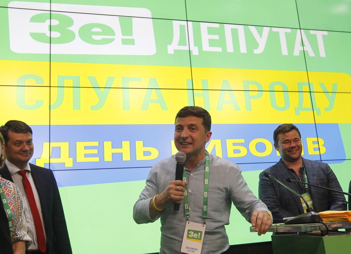 KIEV, UKRAINE - 2019/07/21: Ukrainian President Volodymyr Zelensky (R) and head of the Servant of the people party Dmytro Razumkov (L) react after the exit polls results following a day of polling in the country's parliamentary election, at his party Servant of the People (Sluga Narodu)'s election headquarters in Kiev.
On 20 May 2019 Ukrainian President Volodymyr Zelensky during his inauguration announced about dissolved Parliament and scheduled early Parliamentary elections for July 21. (Photo by Pavlo Gonchar/SOPA Images/LightRocket via Getty Images)