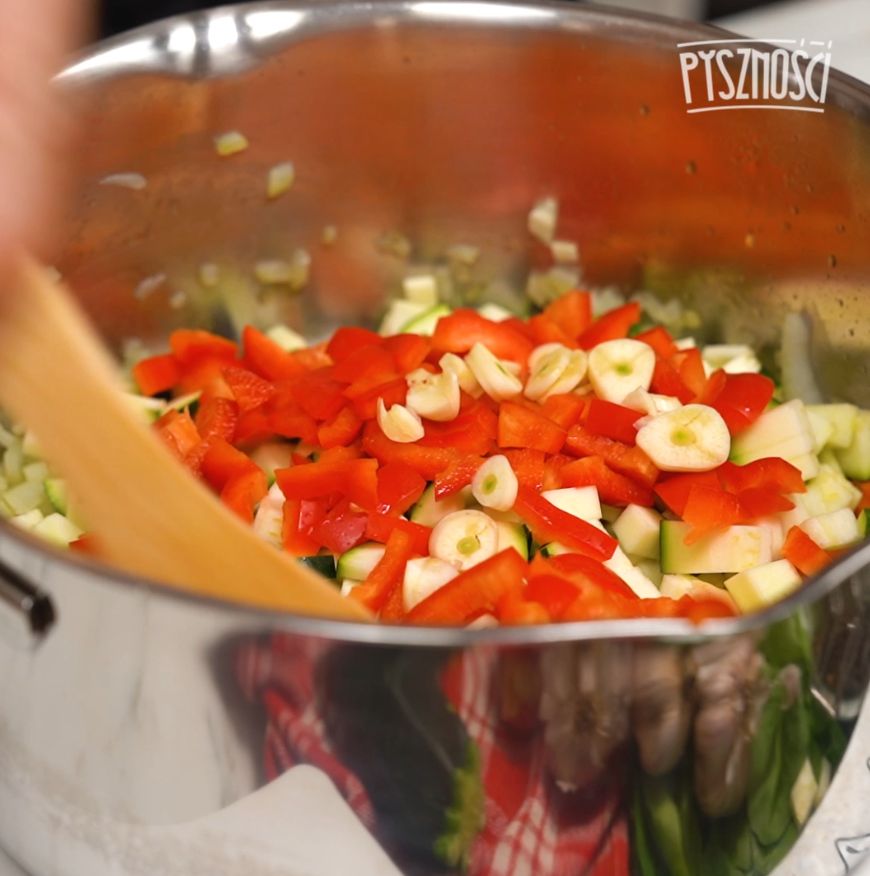 The soup is colorful from the vegetables.
