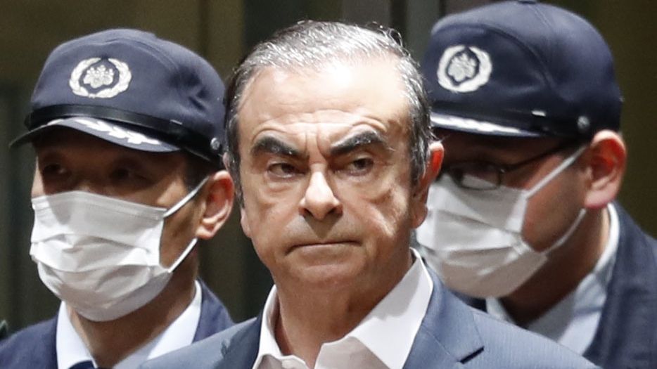 File photo taken April 25, 2019, shows former Nissan Motor Co. Chairman Carlos Ghosn being released from the Tokyo Detention House on bail for a second time. Ghosn escaped to Lebanon in December that year. (Photo by Kyodo News via Getty Images)