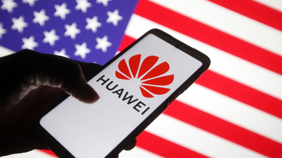 UKRAINE - 2021/01/19: In this photo illustration a Huawei logo is seen displayed on a mobile phone with the U.S. flag in the background. The US notified Huawei suppliers to revoke some licenses, reportedly by media. (Photo Illustration by Pavlo Gonchar/SOPA Images/LightRocket via Getty Images)