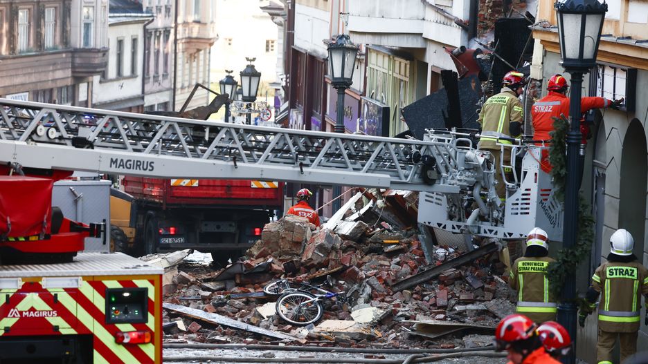 Fire fighters work on the site of the tenement house collapse in Cieszyn, Poland on December 29, 2024. (Photo by Jakub Porzycki/NurPhoto via Getty Images)