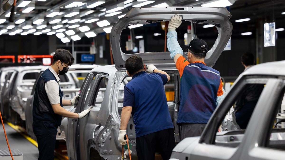 Employees assemble Hyundai Motor Co. Casper mini sport utility vehicles (SUV) on the production line at the Gwangju Global Motors (GGM) factory in Gwangju, South Korea, on Wednesday, Oct. 13, 2021. Gwangju Global Motors started production of Casper from September and aims to produce about 70,000 vehicles annually, according to the company. Photographer: SeongJoon Cho/Bloomberg via Getty Images
