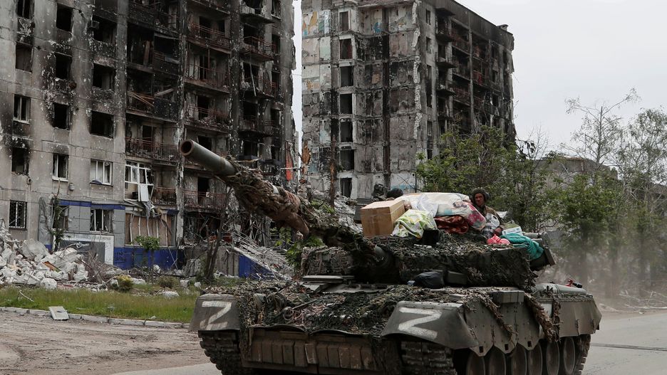 Service members of pro-Russian troops drive a tank along a street in PopasnaService members of pro-Russian troops drive a tank along a street past a destroyed residential building during Ukraine-Russia conflict in the town of Popasna in the Luhansk Region, Ukraine May 26, 2022.,Image: 694801583, License: Rights-managed, Restrictions: , Model Release: no, Credit line: ALEXANDER ERMOCHENKO / Reuters / ForumALEXANDER ERMOCHENKO / Reuters / Forumdefence, civil unrest, war, category_code_def, category_code_europ, category_code_war, category_code_vio, category_code_defence, category_code_civil unrest