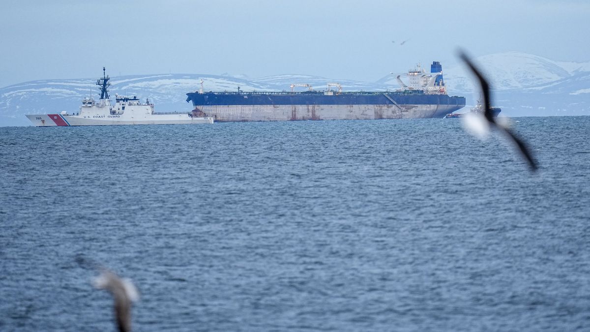 BURGHEAD, SCOTLAND - JANUARY 14: A US Coast Guard ship accompanies the Marinera oil tanker on January 14, 2026 in Burghead, Scotland. The Marinera oil tanker, previously known as the Bella 1, has entered UK waters at the request of the US to be replenished with "essential supplies." The Russian-flagged tanker was seized by US forces on 7 January 2026, between Iceland and Scotland, for allegedly violating sanctions by transporting oil for Venezuela, Russia, and Iran. (Photo by Peter Summers/Getty Images)