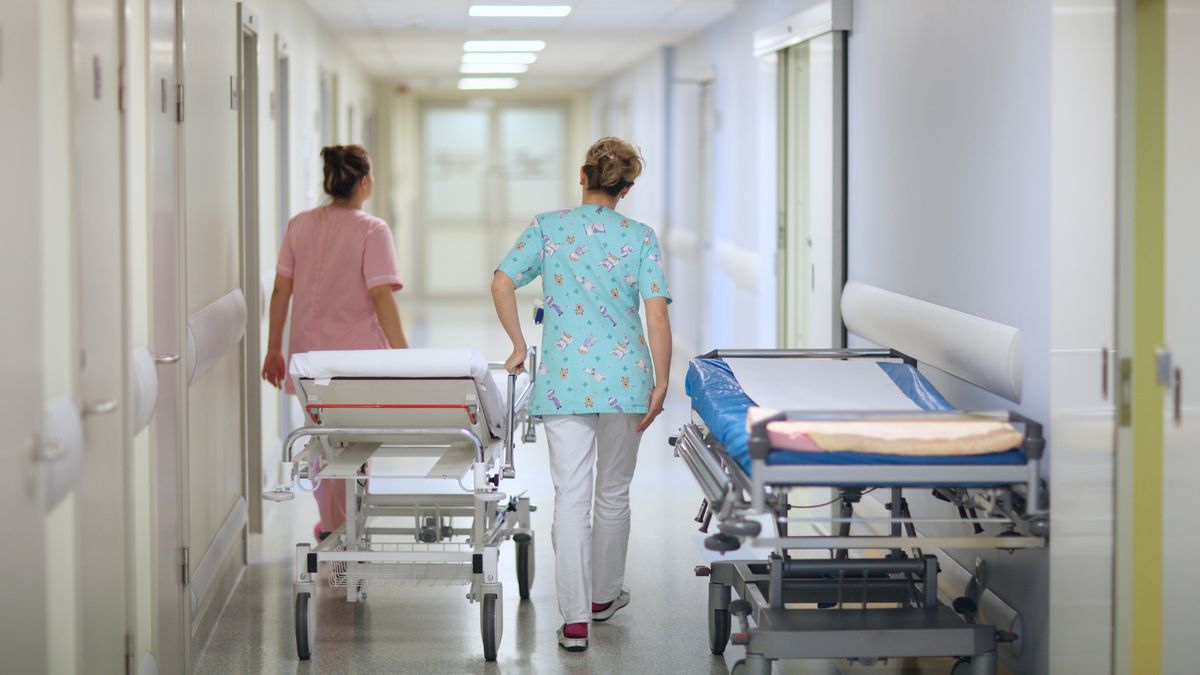 Nurses pushing a mobile bed in a hospital corridor(c) Anna Jurkovskatwo, scrub, medical, doctor, clinic, healthcare, worker, hospital, couch, equipment, furniture, mobile, drag, uniform, orderly, nurse, paramedic, castors, wheel, roller, corridor, handle, medical service, gurney, disabled, stretcher, treatment, cushioned, go, working, movable, pushing, empty, ambulatory, emergency, adjustable, padding, railing, back, women, staff, help, illness, two, scrub, medical, doctor, clinic, healthcare, worker, hospital, couch, equipment, furniture, mobile, drag, uniform, orderly, nurse, paramedic, castors, wheel, roller, corridor, handle, medical service, gurney, disabled, stretcher, treatment, cushioned, go, working, movable, pushing, empty, ambulatory, emergency, adjustable, padding, railing, back, women, staff, help, illness