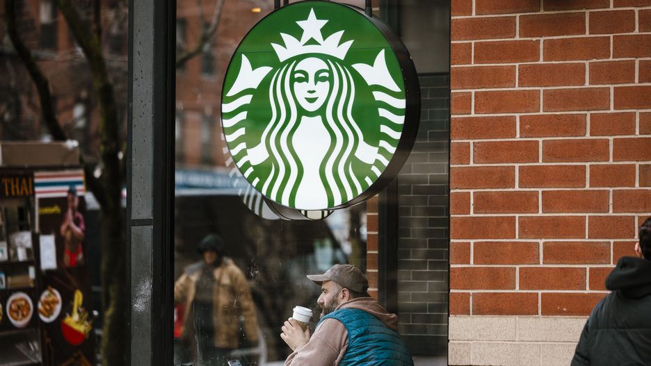 A customer inside a Starbucks coffee shop in New York, US, on Monday, Jan. 29, 2024. Starbucks Corp. released earnings figures on January 30. Photographer: Angus Mordant/Bloomberg via Getty Images