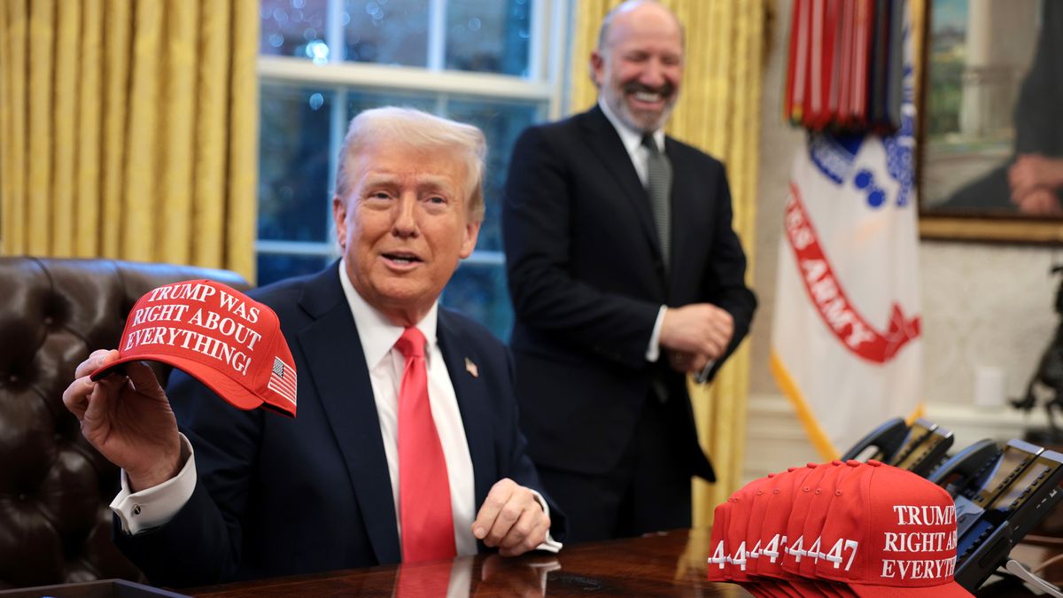 WASHINGTON, DC - FEBRUARY 25: U.S. President Donald Trump holds up a hat stating "Trump Was Right About Everything" after signing executive orders in the Oval Office at the White House on February 25, 2025 in Washington, DC. Trump signed an executive order on price transparency requirements for the health care industry and directed the Commerce Department to open an investigation into potential tariffs for copper imports. (Photo by Alex Wong/Getty Images)