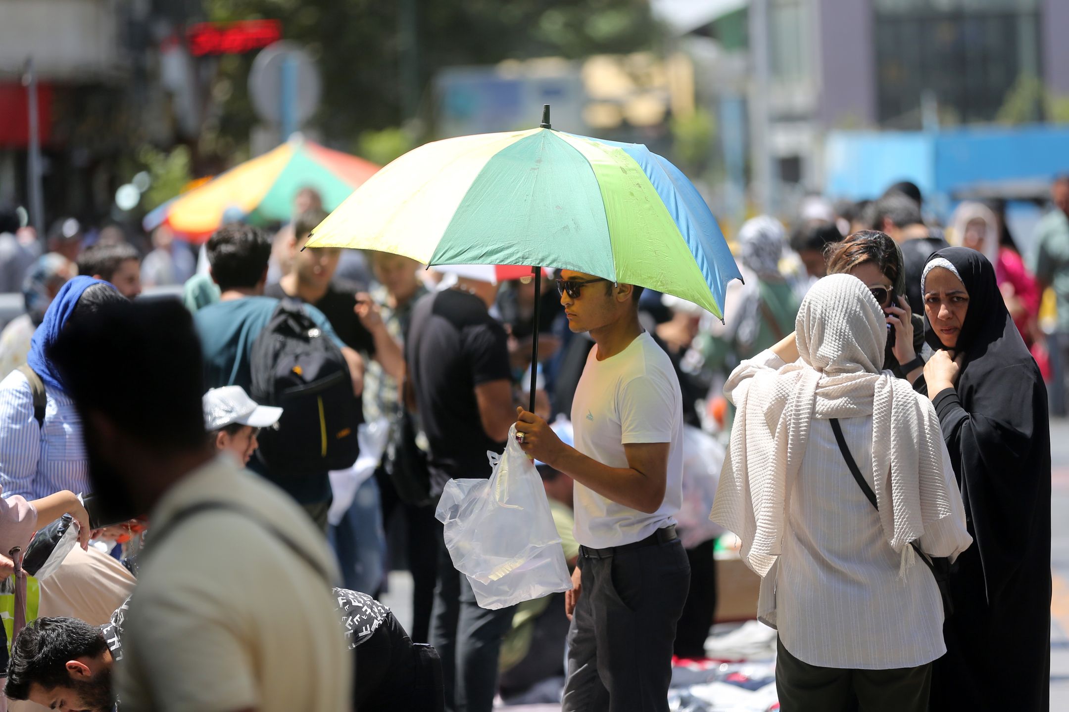 Two-day holiday due to scorching heat in Iran
TEHRAN, IRAN - AUGUST 02: People use umbrellas to shield from the sun on a calm day during the two-day holiday over extreme heat in Tehran, Iran on August 02, 2023. Starting from today, Iran announces two days off for the whole country, where in southern parts temperatures reach up to 50 degrees Celcius. (Photo by Fatemeh Bahrami/Anadolu Agency via Getty Images)
Anadolu
extreme, heat, hot, soaring temperatures