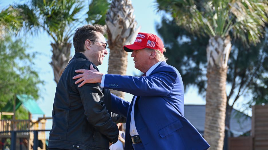 BROWNSVILLE, TEXAS - NOVEMBER 19: U.S. President-elect Donald Trump greets Elon Musk as he arrives to attend a viewing of the launch of the sixth test flight of the SpaceX Starship rocket on November 19, 2024 in Brownsville, Texas. SpaceX’s billionaire owner, Elon Musk, a Trump confidante, has been tapped to lead the new Department of Government Efficiency alongside former presidential candidate Vivek Ramaswamy. (Photo by Brandon Bell/Getty Images)