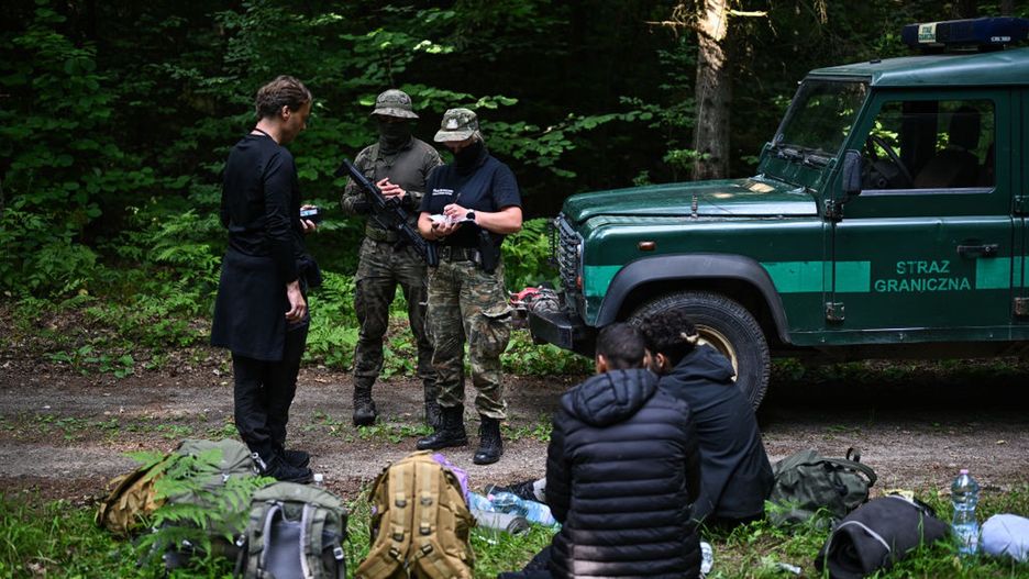 Poland Strengthens Border Enforcement Near Belarus Amid Wagner Concerns
BIALOWIEZA, POLAND - JULY 08: Bartek, a worker of Ocalenie Foundation speaks with Polish border guard about an asylum request as he represents migrants from Morocco who lived in the forest for 23 days and claimed to be pushed back to Belarus 3 times on  July 08, 2023 in Bialowieza, Poland. Last week, the Polish government announced it was sending 500 counterterrorism police to the border with Belarus amid fears that the Wagner Group, the Russian private army, would be relocating to Belarus following its recent aborted mutiny in Russia. Poland has already stationed 5,000 security guards and 2,000 soldiers on the border, with the country's interior minister calling it a "tense situation." Beyond the Wagner worries, the border also remains a popular route for migrants looking to enter the European Union. In 2021, the Belarusian government tried to weaponize this trend by bringing thousands of migrants - mostly from the Middle East - to the country's borders with Poland and Lithuania, creating a crisis at their border crossings. (Photo by Omar Marques/Getty Images)
Omar Marques
bestof, topix
