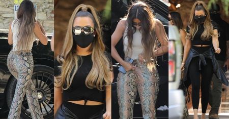 Wężowa Kim Kardashian i jej fit siostra Khloe parkują przed domem przyjaciół w Malibu (ZDJĘCIA)