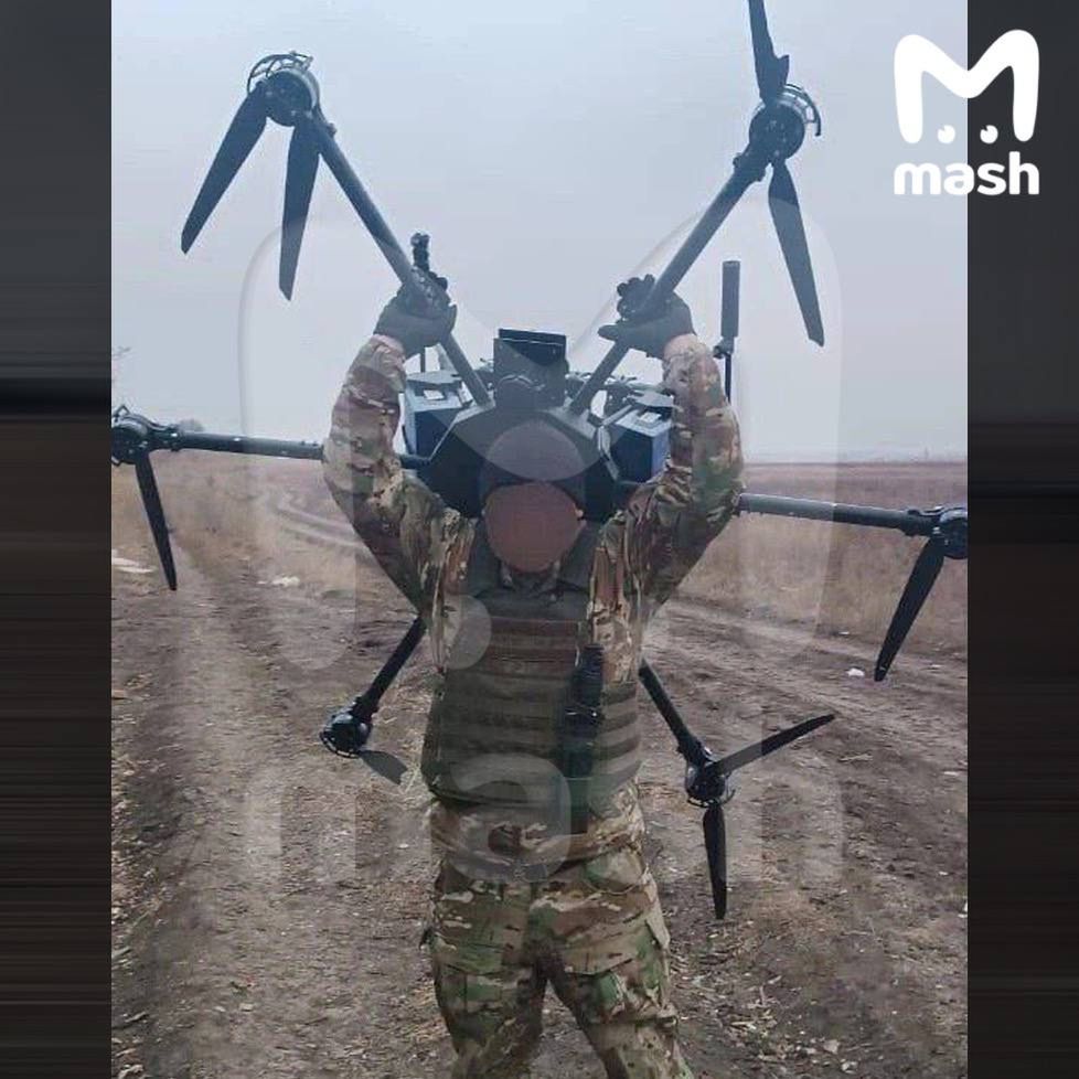 Ukrainian soldier with the "Baba Yaga" drone.