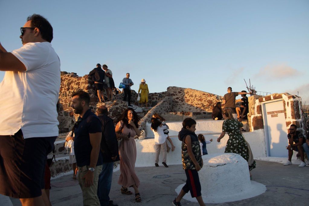 During the holidays, Santorini is flooded with crowds of tourists.