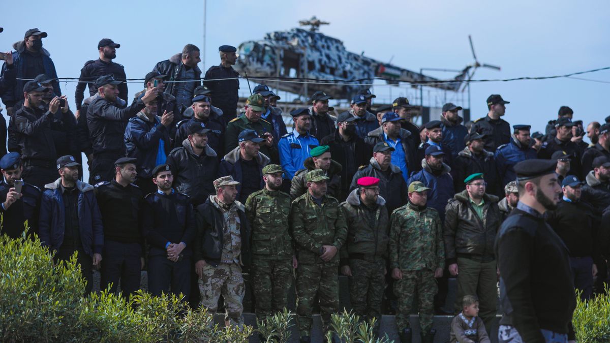 Members of Palestinian security forces loyal to Hamas take part in a graduation ceremony in Gaza City February 21, 2022. (Photo by Momen Faiz/NurPhoto via Getty Images)