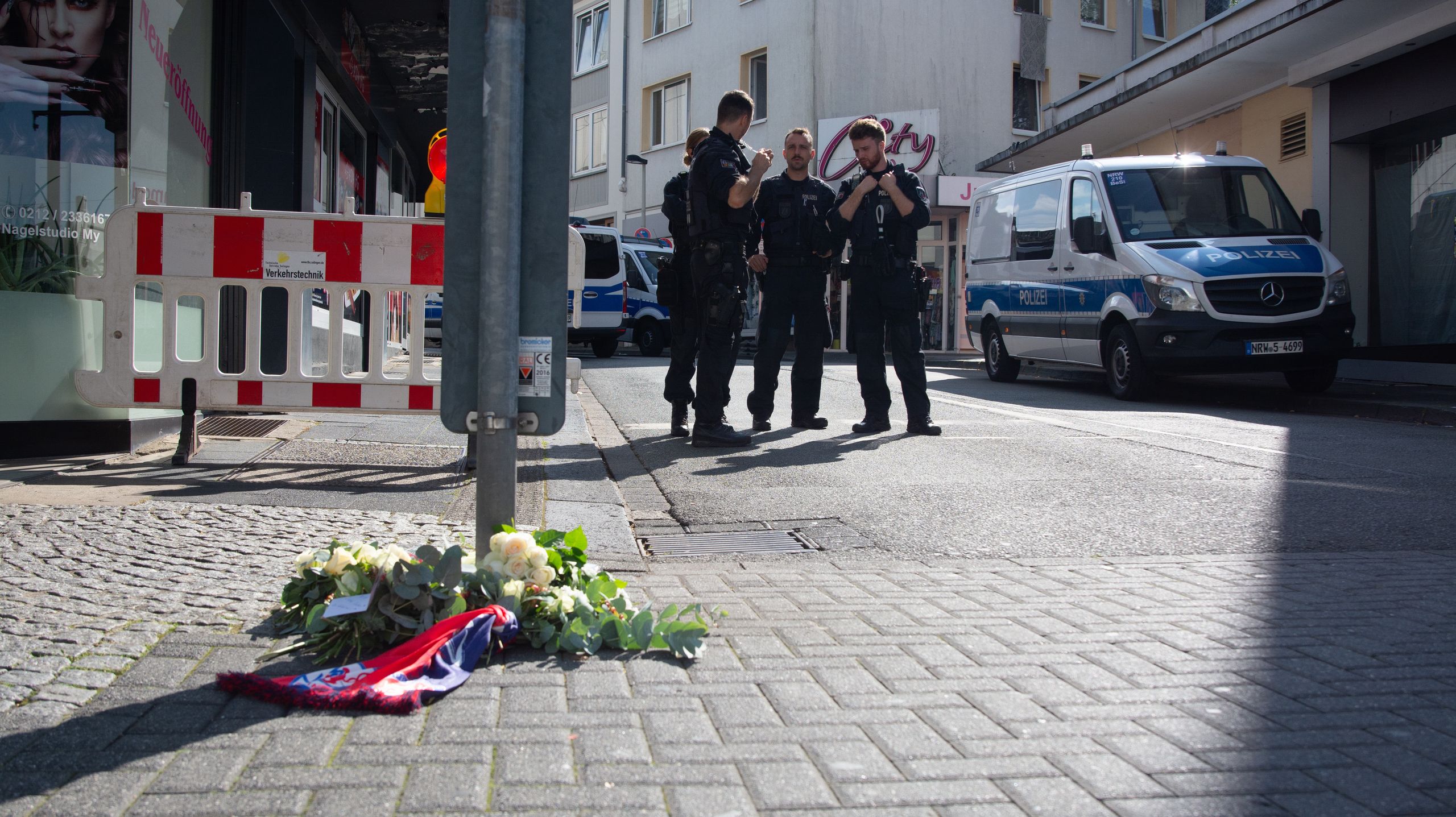 Police seal off the stabbing site after a stabbing attack at a local festival, which kills three and injures eight people in Solingen, Germany, on August 24, 2024. (Photo by Ying Tang/NurPhoto via Getty Images)