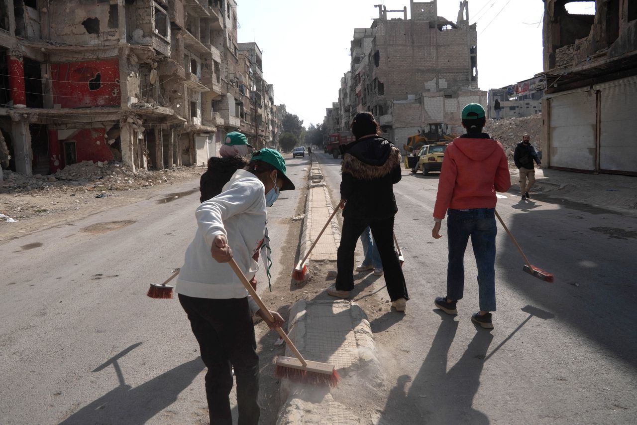 Syrians in the Yarmouk camp in Damascus are clearing debris and trying to make the area habitable again on December 20, 2024.